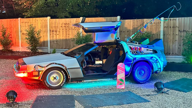 DeLorean Time Machine at night with full lighting effects