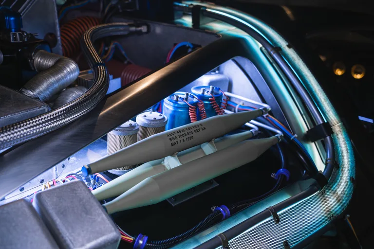 Screen-accurate plutonium chamber and fuel cells inside the DeLorean Time Machine engine bay