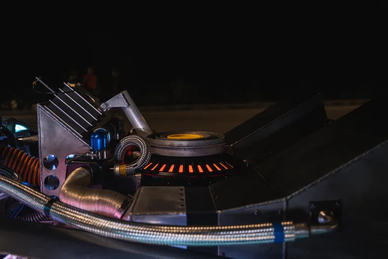 Mr Fusion reactor close-up with glowing orange grille — DeLorean Time Machine rear detail
