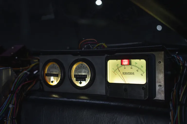 Plutonium chamber gauges including the iconic ROENTGENS radiation meter — DeLorean Time Machine detail