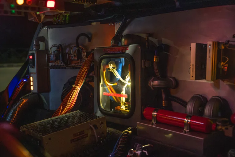 Flux capacitor close-up — the iconic Y-shaped device glowing inside the DeLorean Time Machine
